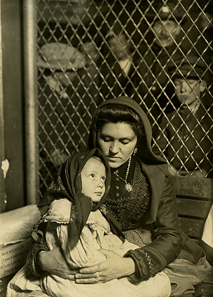 Italian immigrant mother and child, Ellis Island, New York, 1905
