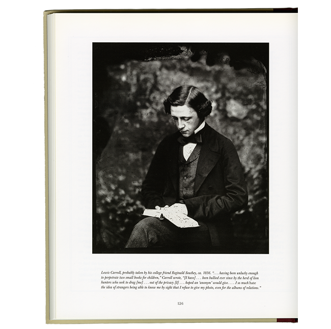 Lewis Carroll reading a book, photo probably taken by his college friend Reginald Southey, ca. 1856