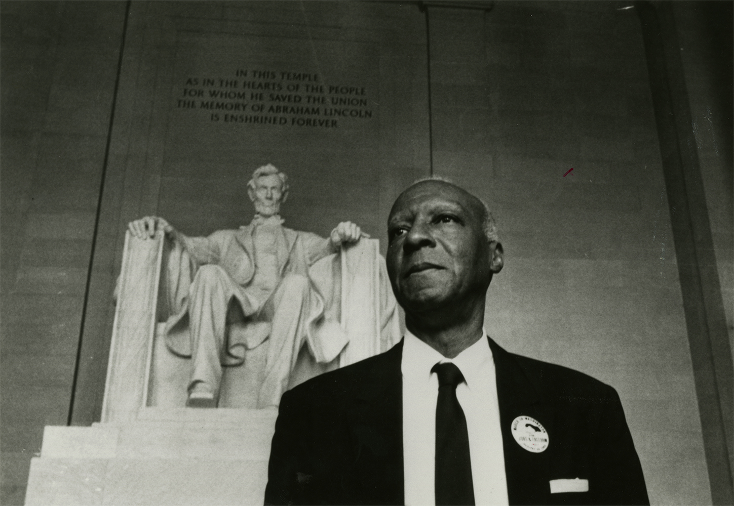 A. Philip Randolph poses before the Lincoln Memorial