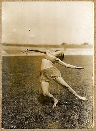 Hertha Feist dancing in field