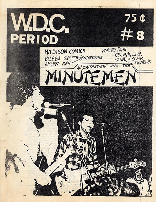 WDC Period, Issue 8 cover  with a photo of the band singing at a concert.