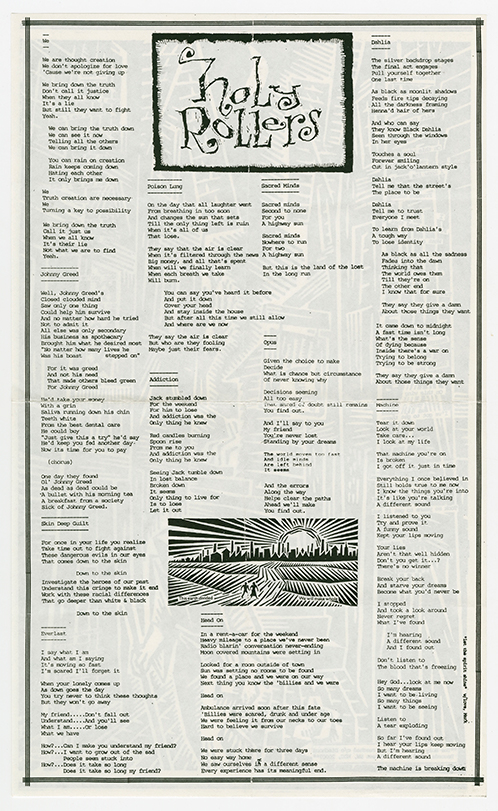 Holy Rollers lyric sheet with an illustration of two figures on the road toward a city with the sun rising behind it.