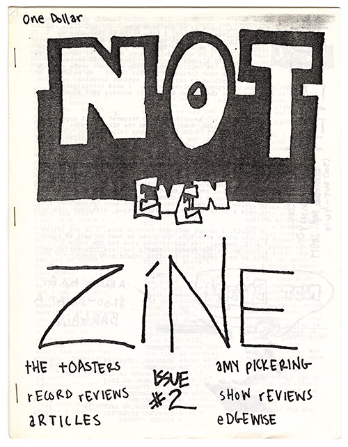 Handwritten issue cover in black and white.