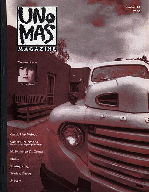 A zine cover with a large desaturated photograph of an early Ford F1 truck parked alongside w building with a bench in front of it.