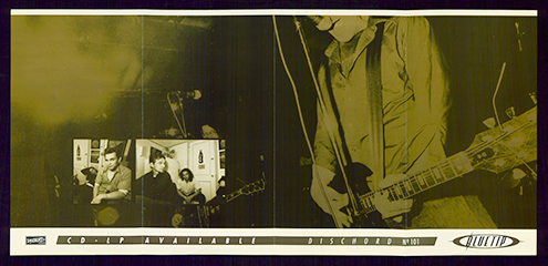 Wide landscape-oriented poster made up of a large sepia-toned photograph of musicians playing guitar and electric bass onstage superimposed with a smaller phot of three men sitting indoors above information about a record release in small print.