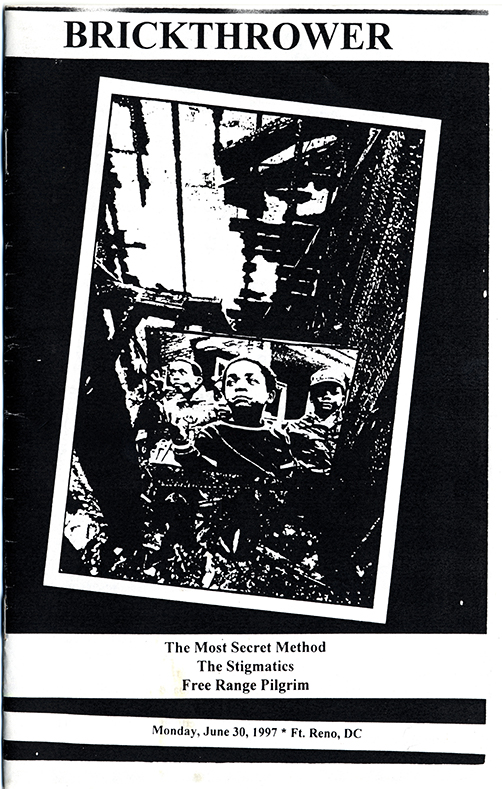 Black and white zine cover with a small picture of three children superimposed on a grainy photograph of a caved-in cieling, viewed from below.