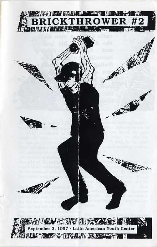 Black and white zine cover with a large illustration of a muscular person wearing a black cap, short-sleeve shirt, and pants raising a brick over their head, ringed with jagged bolts.